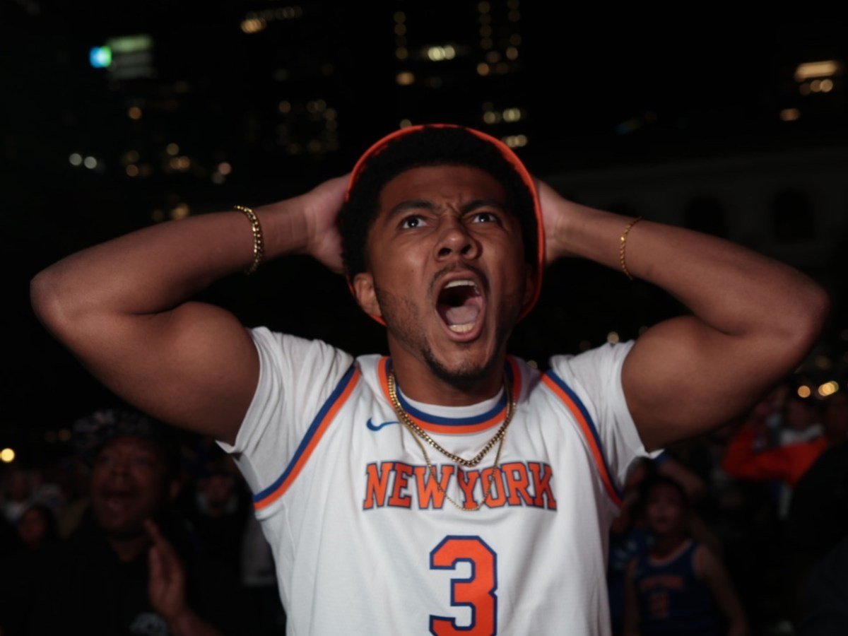 Knicks fans at a watch party in Bryant Park show their frustration at the end of game 3 of the NBA finals,