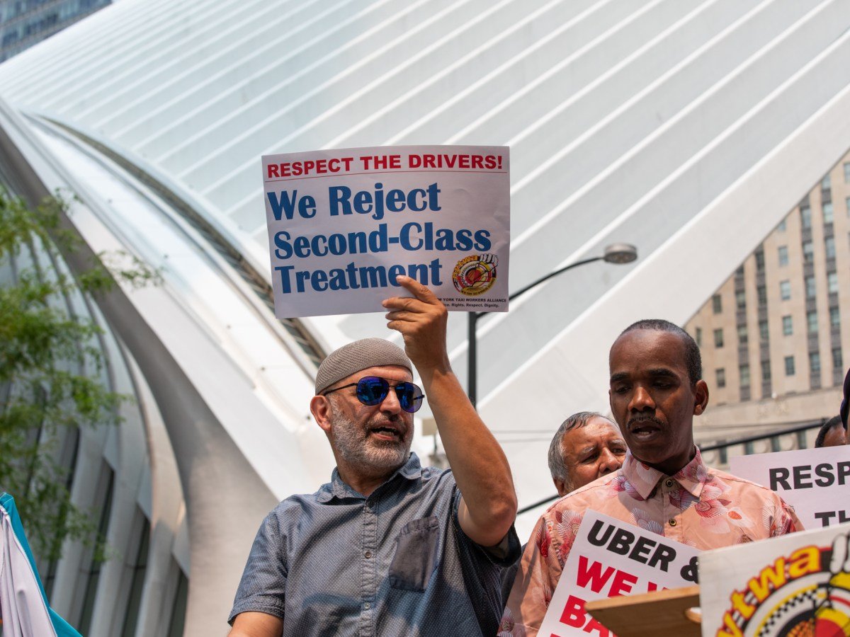 Unionized Uber drivers protest outside the company’s World Trade Center headquarters against what they described as unfair account deactivations